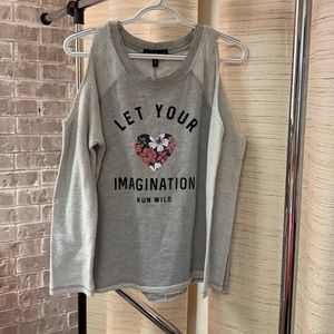 Graphic sweater with shoulder holes, gently used